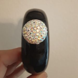 FLASK BANGLE BRACELET WITH A ROUND SPARKLY TOP